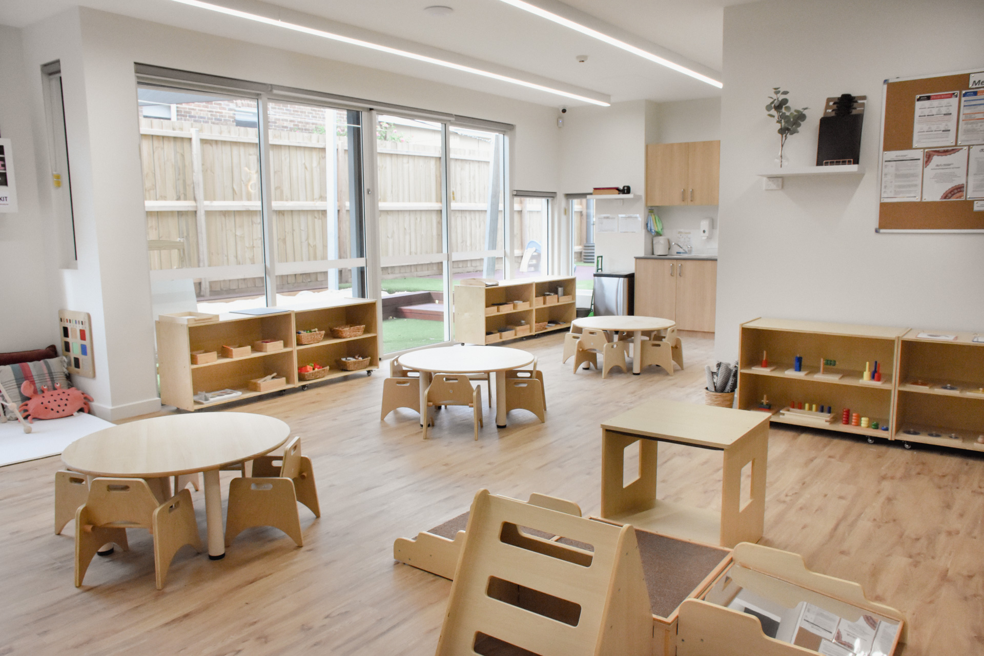 Childcare Infant Classroom with Montessori materials on shelves